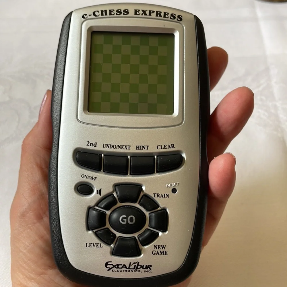 Excalibur electronics e-chess express game handheld pocket portable